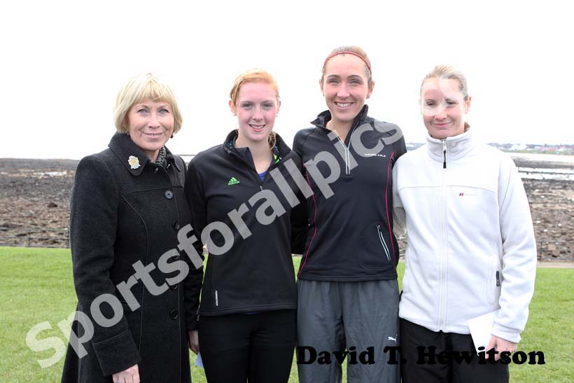 Mayor of North Tyneside Linda Arkley, 2nd Charlotte Arter (Cardiff),  winner Justina Heslop (Clapham) and 3rd Danielle Hodgkinson, North Tyneside 10k Road Race from North Shields to Whitley Bay.